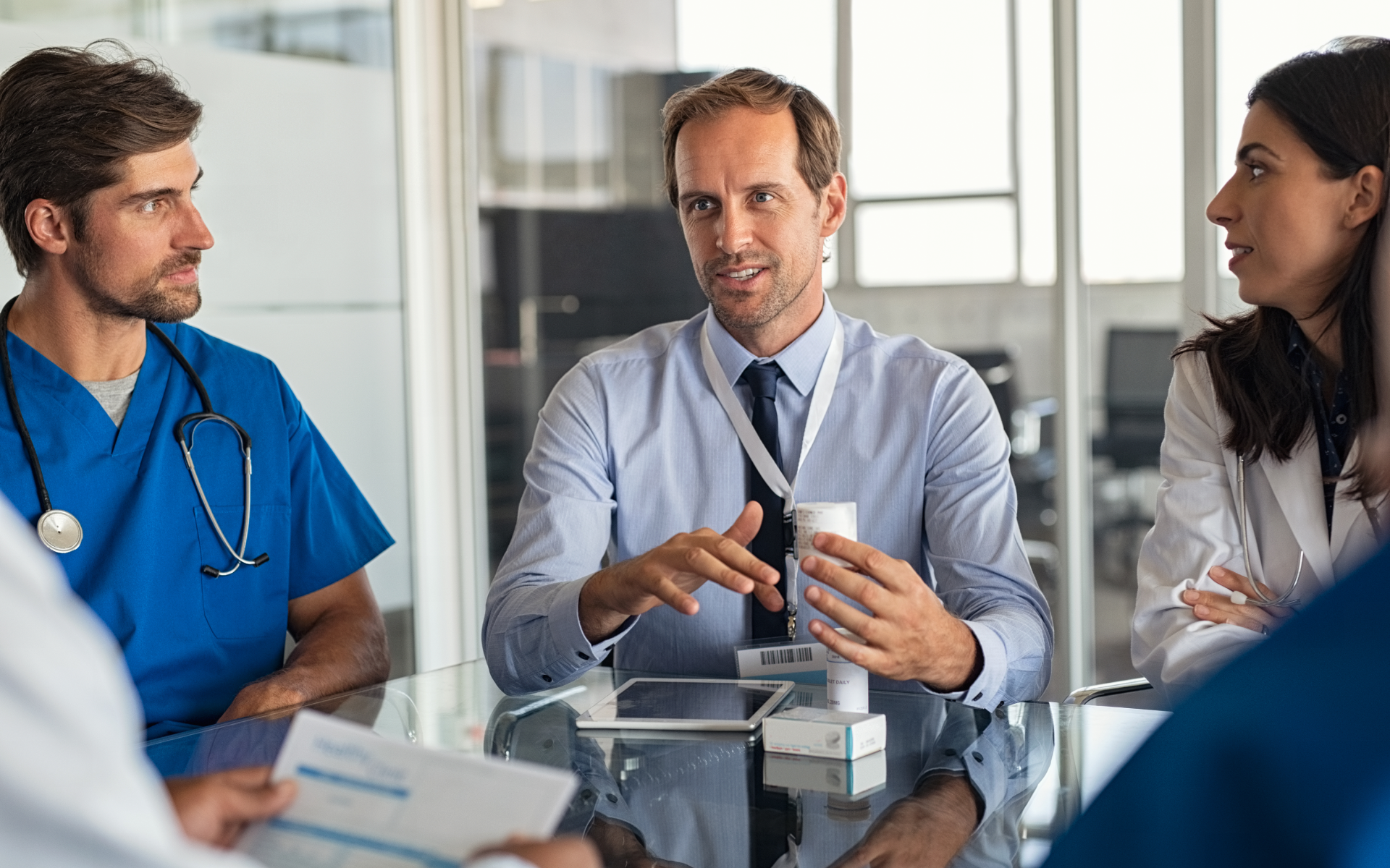Healthcare team meeting around a table